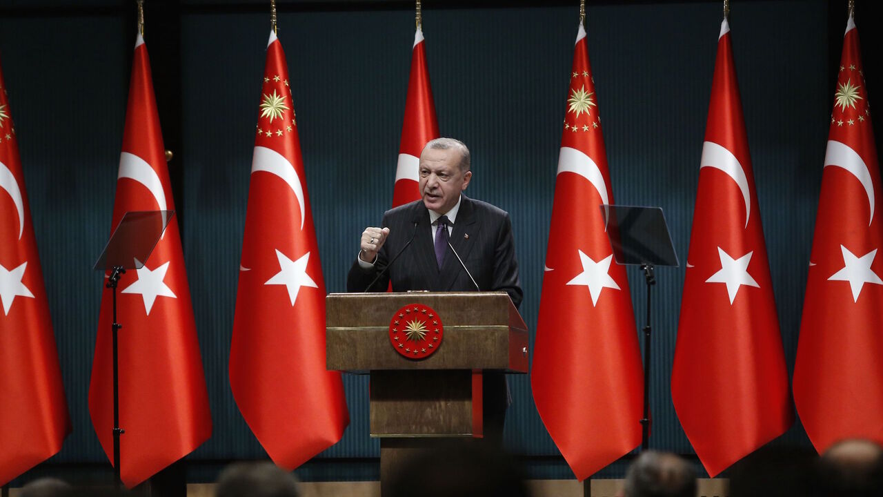 1230127229 President of Turkey Recep Tayyip Erdogan makes a statement after chairing the cabinet meeting in Ankara, on December 14, 2020. (Photo by Adem ALTAN / AFP) (Photo by ADEM ALTAN/AFP via Getty Images)
