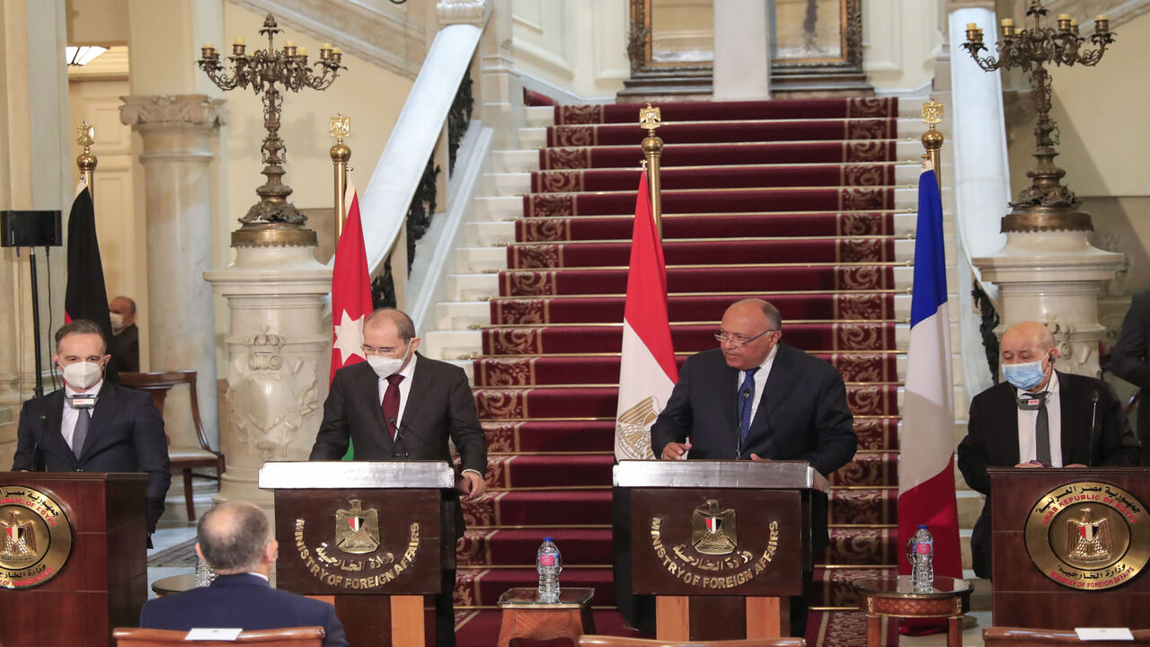 1230532156 Foreign Ministers of (L to R) Germany Heiko Maas, Jordan Ayman Safadi, Egypt Sameh Shoukry, and France Jean-Yves Le Drian, hold a joint press conference after a meeting to discuss the Middle East peace process, in the Egyptian capital Cairo, on January 11, 2021. (Photo by Khaled DESOUKI / AFP) (Photo by KHALED DESOUKI/AFP via Getty Images)