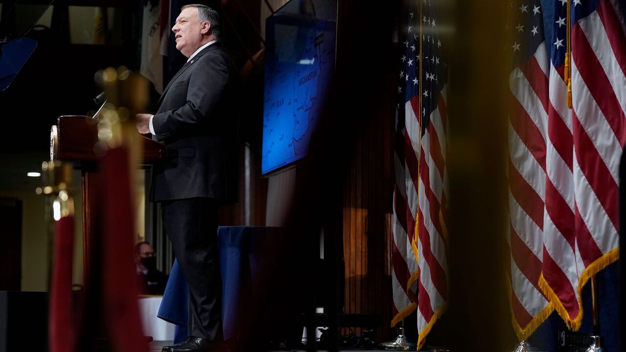 1230548365 US Secretary of State Mike Pompeo speaks at the National Press Club in Washington,DC on January 12, 2021. - US Secretary of State Mike Pompeo alleged Tuesday that arch-enemy Iran has become a new "home base" for Al-Qaeda worse than Afghanistan, an assertion questioned by experts. (Photo by Andrew Harnik / POOL / AFP) (Photo by ANDREW HARNIK/POOL/AFP via Getty Images)