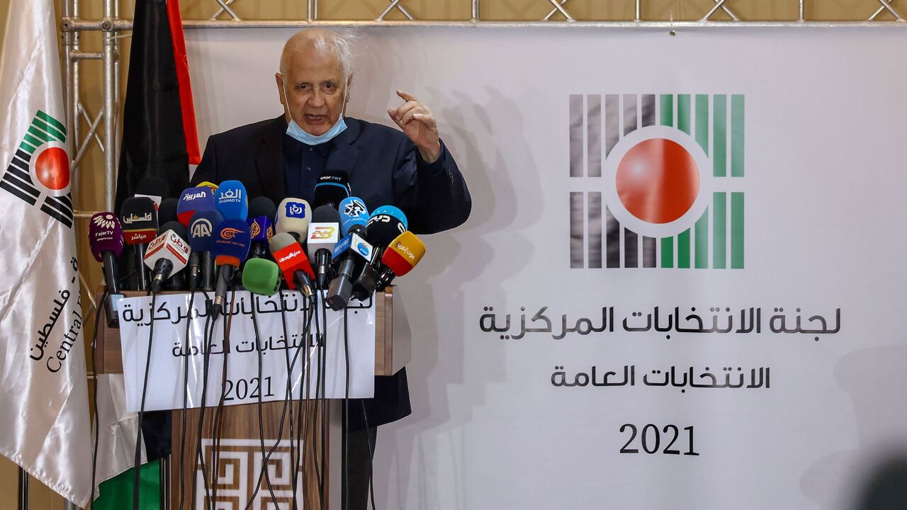 Hanna Nasir, head of the Palestinian Central Election Commission, gives a press conference in the West Bank city of Ramallah, on January 16, 2021. - Palestinian president Mahmud Abbas announced yesterday dates for the first Palestinian elections in more than 15 years, setting legislative polls for May 22 and a July 31 presidential vote. 
Abbas's Fatah party, which controls the Palestinian Authority based in the occupied West Bank, and the Hamas Islamists, who hold power in Gaza, have for years expressed int