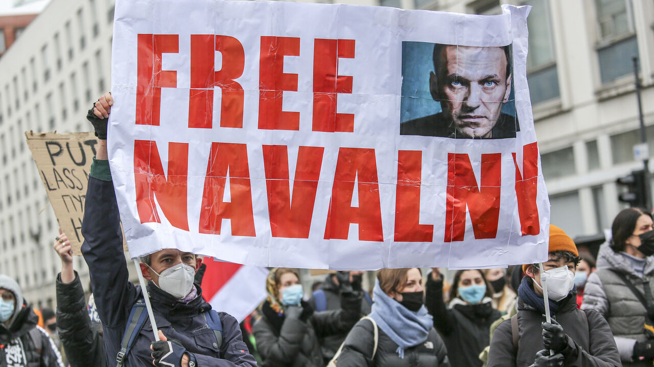 1230743980 BERLIN, GERMANY - JANUARY 23: Some 2500 supporters of Russian opposition politician Alexei Navalny marched in protest demand for his release from prison in Moscow on January 23, 2021 in Berlin, Germany. The protesters marched from the federal chancellery through the Russian embassy to Brandenburg Gate in part also heeding a call by Navalny to protest against Russian President Vladimir Putin. Navalny, who was arrested earlier this week upon his return to Moscow from Germany, has called for protests against