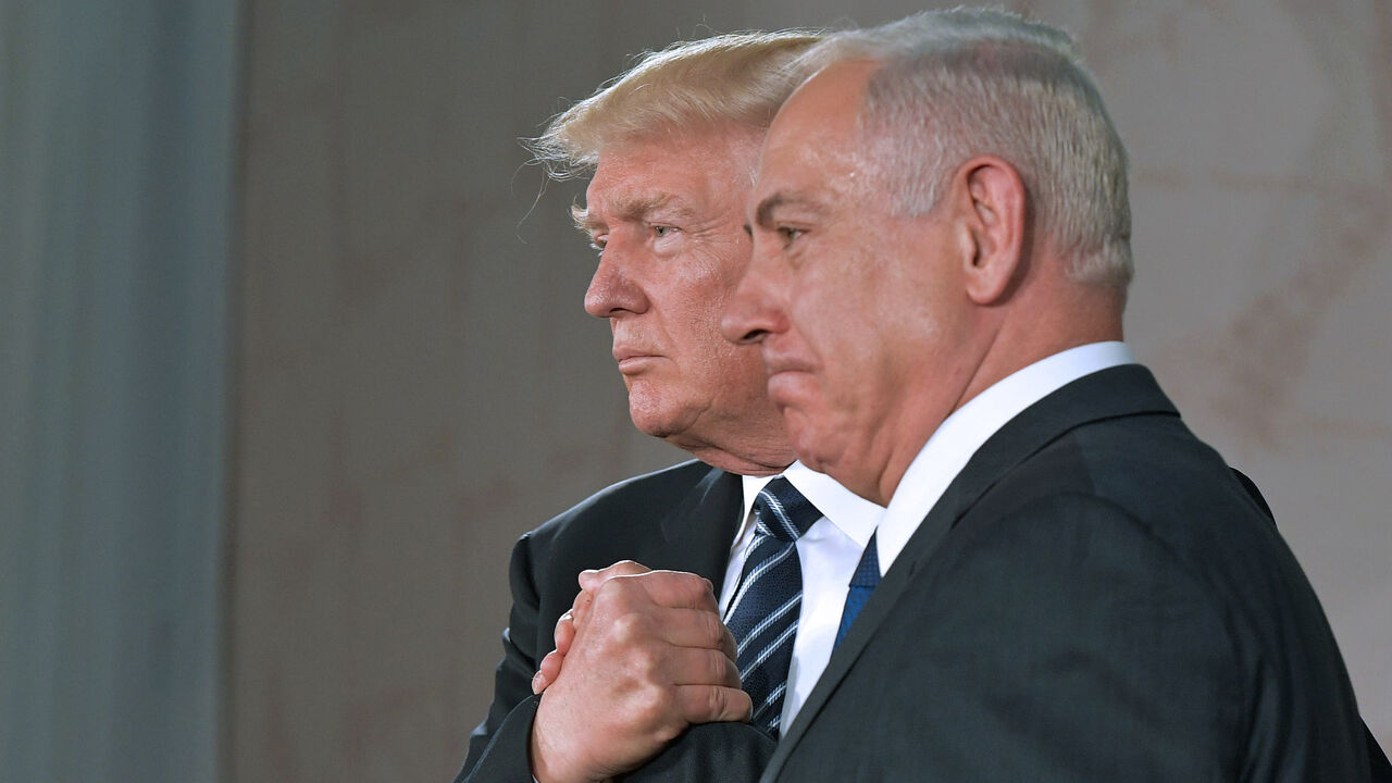 687168784 TOPSHOT - US President Donald Trump (L) and Israel's Prime Minister Benjamin Netanyahu shake hands after delivering a speech at the Israel Museum in Jerusalem on May 23, 2017. / AFP PHOTO / MANDEL NGAN (Photo credit should read MANDEL NGAN/AFP via Getty Images)