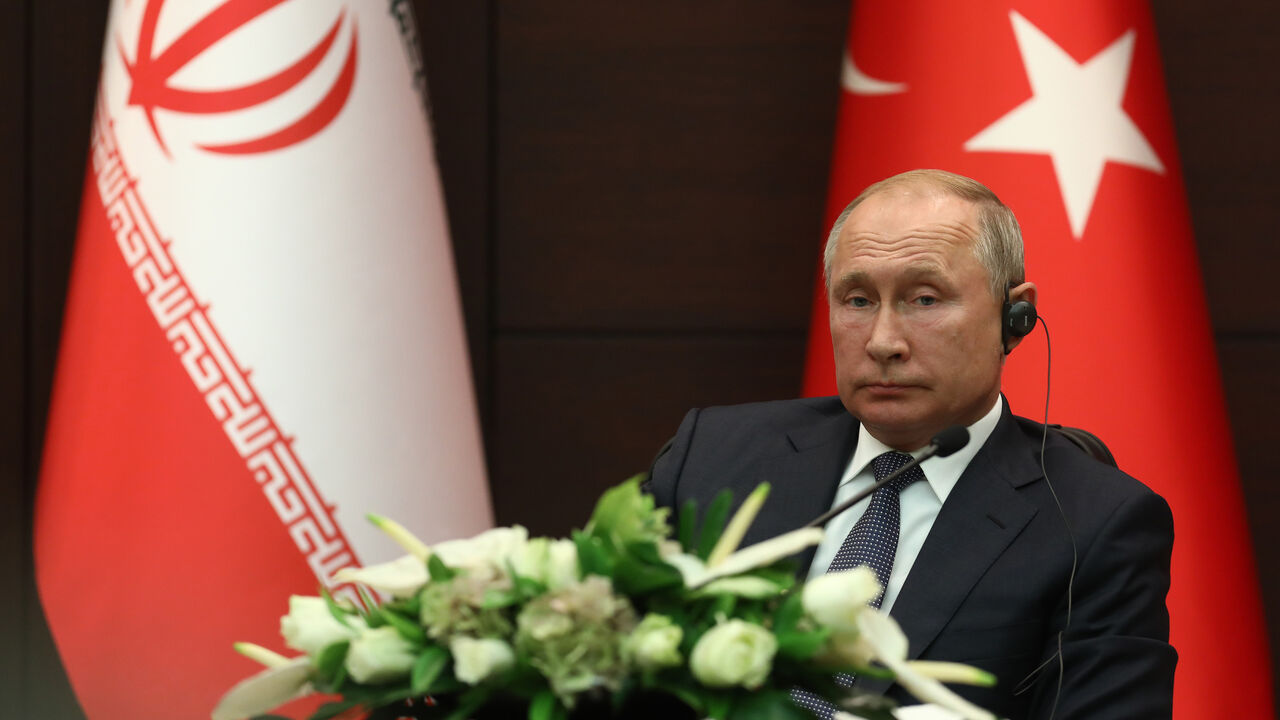 1168692908 Russian President Vladimir Putin attends a press conference with Turkish President and Iranian President after their summit in Ankara, on September 16, 2019. (Photo by Adem ALTAN / AFP) (Photo credit should read ADEM ALTAN/AFP via Getty Images)