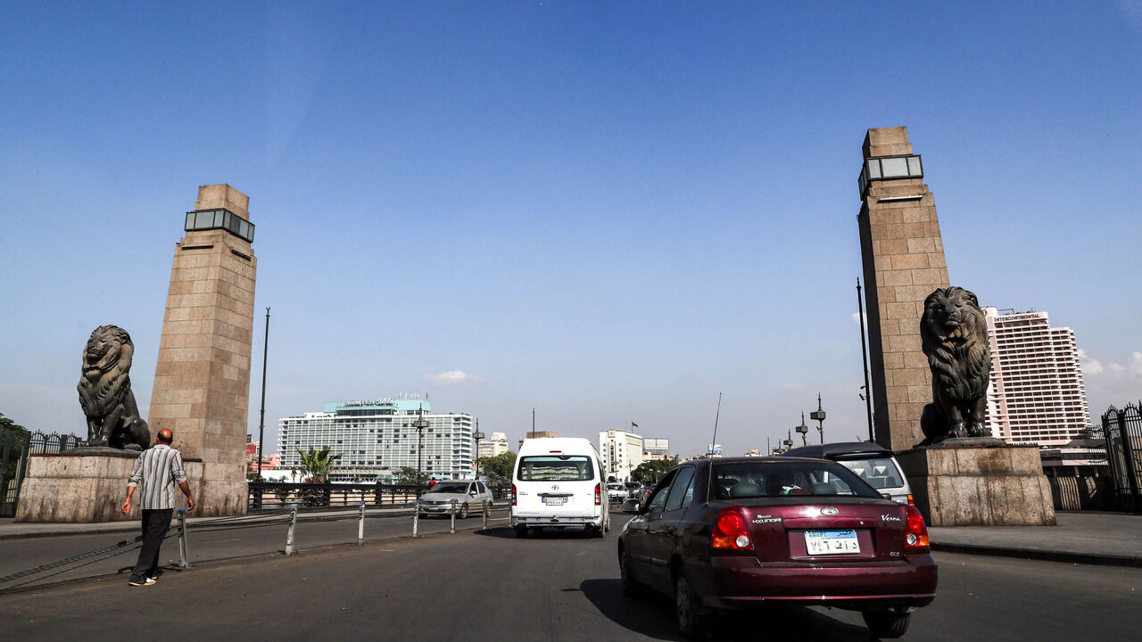 1177753376 This picture taken on October 23, 2019 shows a view of car traffic flowing through the Kasr el-Nil bridge across the Nile river in Egyptian capital Cairo's central Zamalek district. (Photo by Mohamed el-Shahed / AFP) (Photo by MOHAMED EL-SHAHED/AFP via Getty Images)