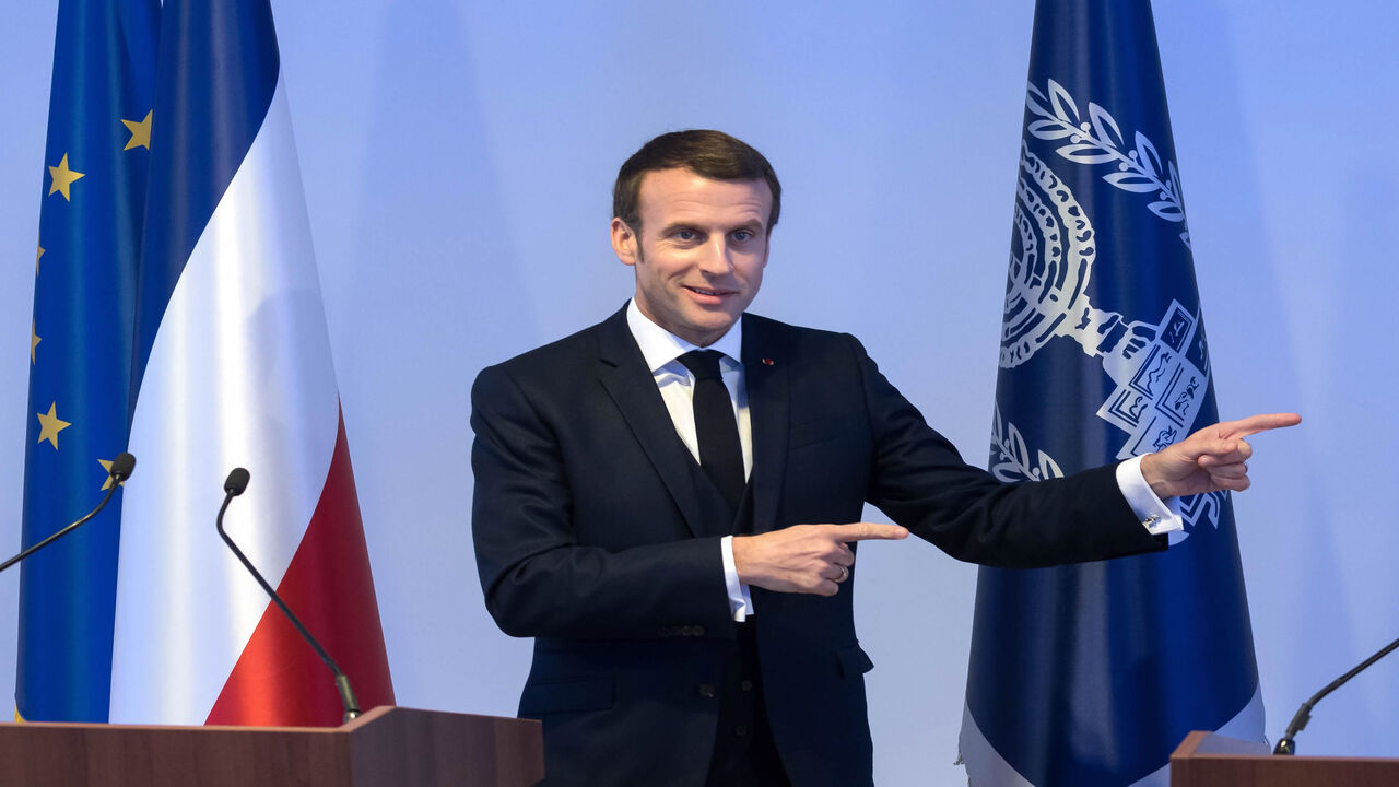 1195295800 French President Emmanuel Macron gestures alongside the Israeli President as they address a press conference in Jerusalem on January 22, 2020, - Israel will lobby key leaders at this week's 75th anniversary of the liberation of Auschwitz on what it considers one of the gravest modern threats to the Jewish people: Iran. Prime Minister Benjamin Netanyahu was meeting Russian President Vladimir Putin, Emmanuel Macron of France and top US officials before an event at the Yad Vashem Holocaust memorial centre in J