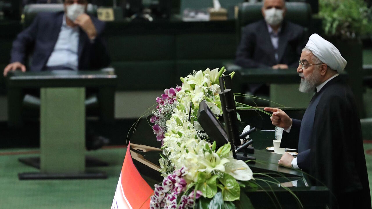 1215439574 Iranian President Hassan Rouhani delivers a speech during the inaugural session of the new parliament following February elections, in Tehran on May 27, 2020. - The 11th legislature since the Islamic revolution of 1979 opened as the country's economy, which has been hard hit by the novel coronavirus, gradually returns to normal. Rouhani, who is in the final year of his second and final term, called on MPs, collectively and individually, to place the "national interest above special interests", "party intere