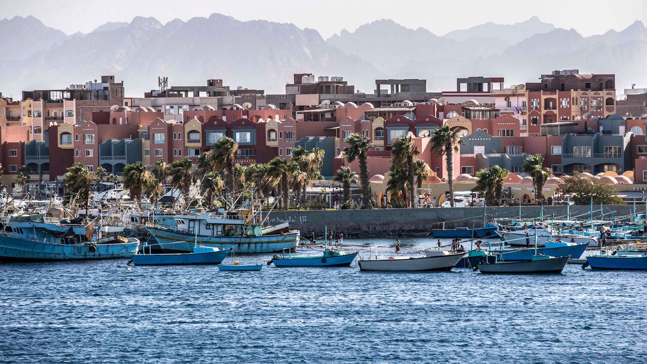 1221109058 This picture taken on June 19, 2020 from a ferry shows a view of the Hurghada Marina in Egypt's southern Red Sea resort city, with the Red Sea hills seen in the background. (Photo by Khaled DESOUKI / AFP) (Photo by KHALED DESOUKI/AFP via Getty Images)