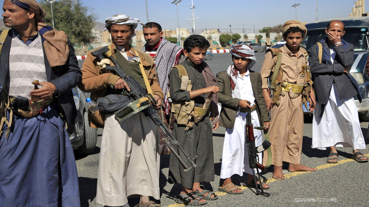 1230967150 Yemeni tribesmen attend a rally denouncing the United States and the outgoing Trump administration's decision to apply the "terrorist" designation to the Iran-backed movement, in the Huthi-held capital Sanaa on February 4, 2021. - Washington is reviewing the designation by the Trump administration, which came into effect the day before Joe Biden took office and sparked fears of further catastrophe in the war-torn country. (Photo by Mohammed HUWAIS / AFP) (Photo by MOHAMMED HUWAIS/AFP via Getty Images)