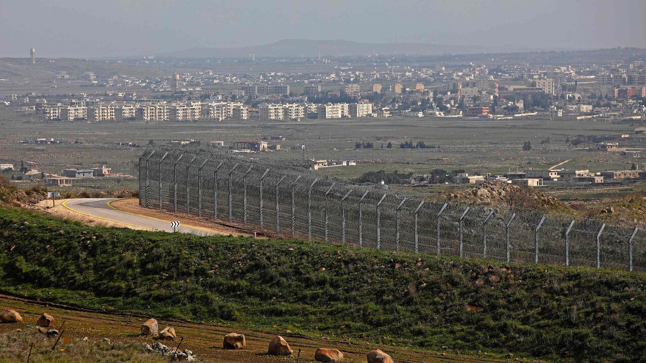 1230967186 This picture taken from the Israeli-annexed Golan Heights on February 4, 2021, shows the border fence with the Syrian governorate of Quneitra. (Photo by JALAA MAREY / AFP) (Photo by JALAA MAREY/AFP via Getty Images)