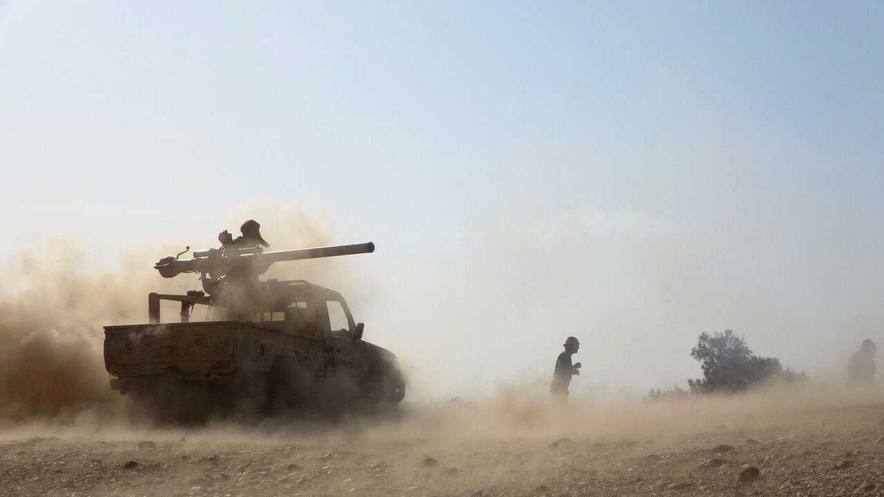 1231196647 Saudi-backed government troops repel a Huthi rebel offensive on oil-rich Marib, some 120 kilometres (75 miles) east of Yemen's rebel-held capital Sanaa, on February 14, 2021. - The UNs humanitarian chief said he was "very alarmed" by a Huthi rebel assault on the Yemeni governments last northern stronghold of Marib, saying it could endanger millions of civilians. (Photo by - / AFP) (Photo by -/AFP via Getty Images)