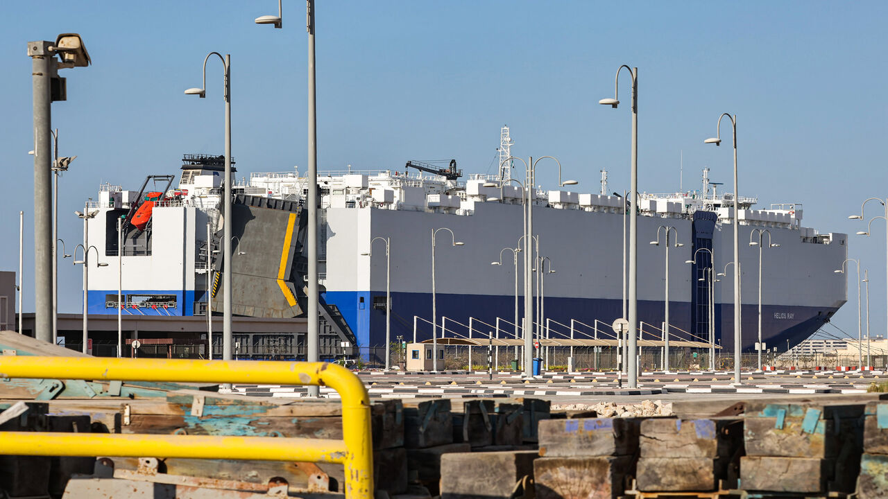 1231432435 This picture taken on February 28, 2021 shows a view of the Israeli-owned Bahamian-flagged MV Helios Ray cargo ship docked in Dubai's Mina Rashid (Port Rashid) cruise terminal. - The MV Helios Ray, a vehicle carrier, was travelling from the Saudi port of Dammam to Singapore when a blast occurred on February 25, according to the London-based Dryad Global maritime security group. (Photo by Giuseppe CACACE / AFP) (Photo by GIUSEPPE CACACE/AFP via Getty Images)