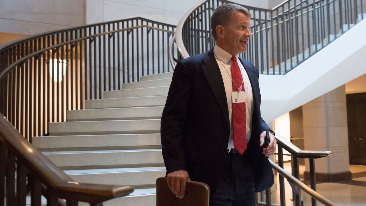 883192812 Erik Prince, former Navy Seal and founder of private military contractor Blackwater USA, arrives to testify during a closed-door House Select Intelligence Committee hearing on Capitol Hill in Washington, DC, November 30, 2017. / AFP PHOTO / SAUL LOEB (Photo credit should read SAUL LOEB/AFP via Getty Images)