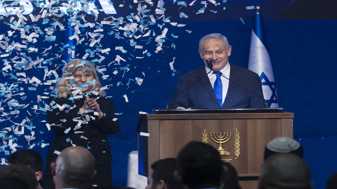 1204870934 TEL AVIV, ISRAEL - MARCH 03: Sara Netanyahu and Israeli Prime Minister Benjamin Netanyahu thank supporters at the Likud Party after vote celebration on March 03, 2020 in Tel Aviv, Israel. Early results show that Netanyahu has claimed victory in Israel's general election, putting him ahead of rival Benny Gantz, but still short of a majority. (Photo by Amir Levy/Getty Images)