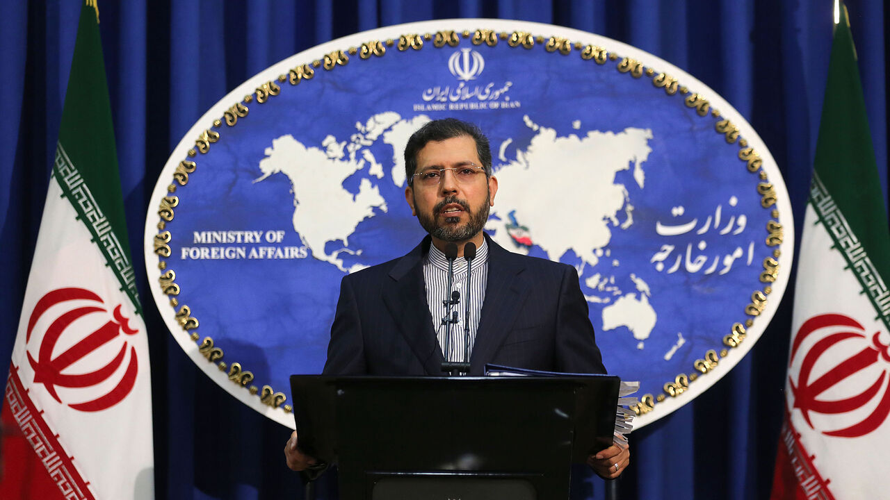 1231320403 Iranian foreign ministry spokesman Saied Khatibzadeh gestures during a press conference in Tehran on February 22, 2021. - Iran hailed as a "significant achievement" a temporary agreement Tehran reached with the head of the UN nuclear watchdog on site inspections. That deal effectively bought time as the United States, European powers and Tehran try to salvage the 2015 nuclear agreement that has been on the brink of collapse since Donald Trump withdrew from it. (Photo by ATTA KENARE / AFP) (Photo by ATTA KEN