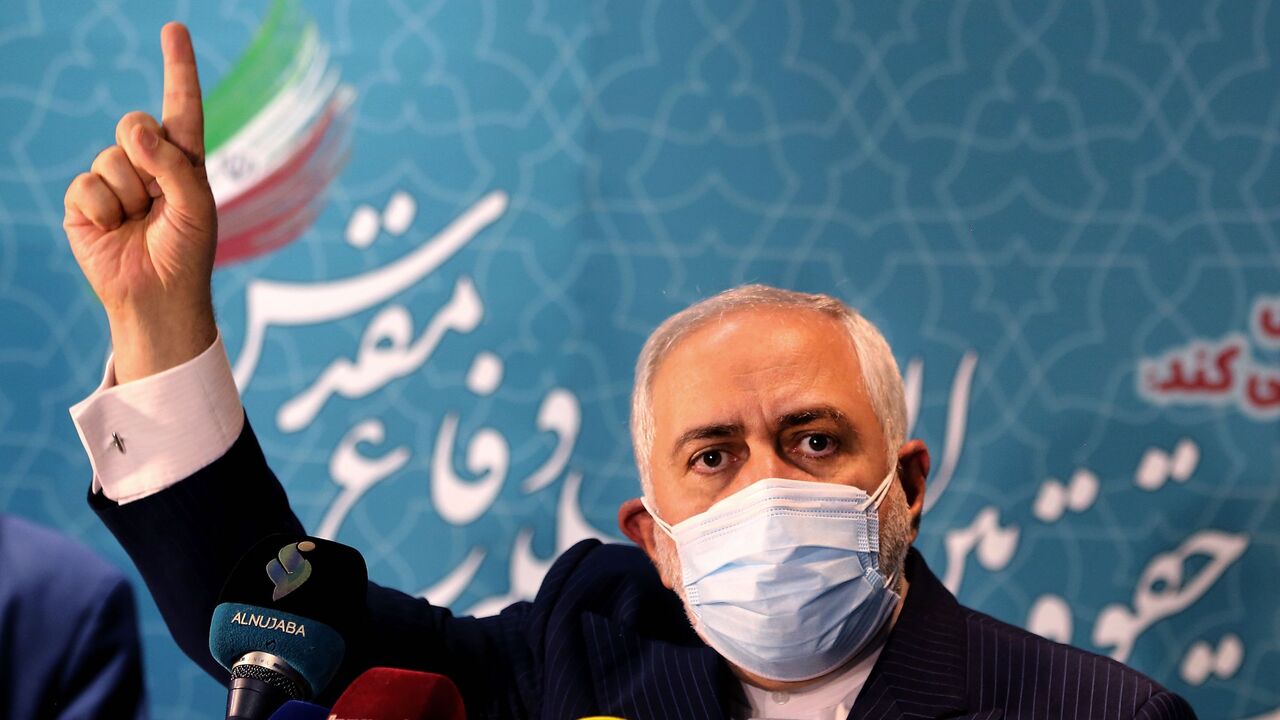 1231336520 Iranian Foreign Minister Mohammad Javad Zarif speaks during a press conference at the International Conference on the Legal-International Claims of the Holy Defense in the capital Tehran on February 23, 2021. (Photo by ATTA KENARE / AFP) (Photo by ATTA KENARE/AFP via Getty Images)