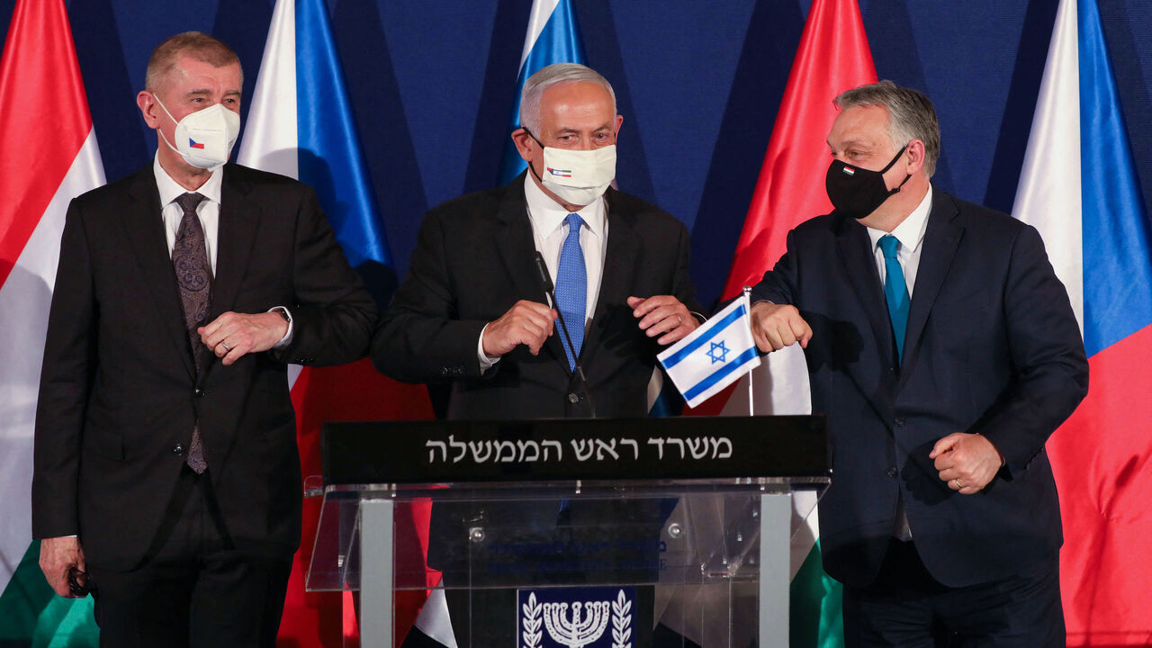 1231648479 Prime Ministers of (L to R) Czech Republic Andrej Babis, Israel Benjamin Netanyahu, and Hungary Viktor Orban, bump elbows during a joint press conference in Jerusalem, on March 11, 2021. (Photo by ABIR SULTAN / POOL / AFP) (Photo by ABIR SULTAN/POOL/AFP via Getty Images)