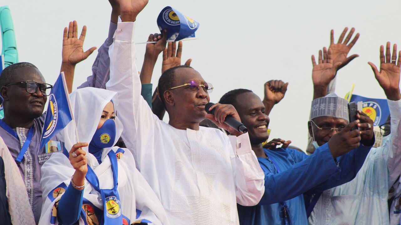CHAD-POLITICS Chad President Idriss Deby Itno (C) waves at supporters during a campaign rally in N'Djamena, Chad, on March 13, 2021. - Chad President Idriss Deby Itno kicked off his campaign for a sixth term on Saturday, calling for unity after rival protests were banned and broken up. (Photo by Renaud MASBEYE BOYBEYE / AFP) (Photo by RENAUD MASBEYE BOYBEYE/AFP via Getty Images)