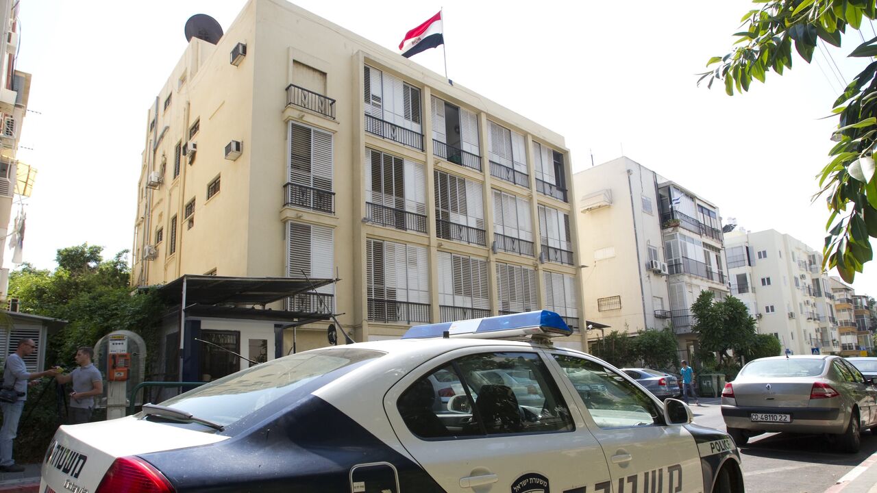 124638207 A Israeli police car is park in front of the Egyptian Embassy in the city of Tel Aviv on September 11, 2011, two days after Egyptian demonstrators went on the rampage in Cairo, breaking into the Israeli embassy and forcing the personnel to be evacuated. The trouble followed several weeks of protests outside the Israeli embassy in Cairo after 5 Egyptian border police were shot dead last month by the Israeli military during a search operation for militants who shot at an Israeli bus in Israel, close to their