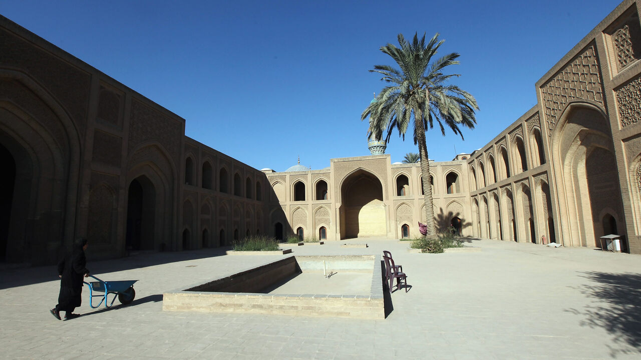 134280735 BAGHDAD, IRAQ - NOVEMBER 30: A woman works at the restored Al-Mustansiriya University, founded in 1227 and one of the oldest Islamic universities in the world, on November 30, 2011 in Baghdad, Iraq. Iraq is transitioning as the U.S. military continues its withdrawal from the country by the end of December following the war that began in 2003. (Photo by Mario Tama/Getty Images)