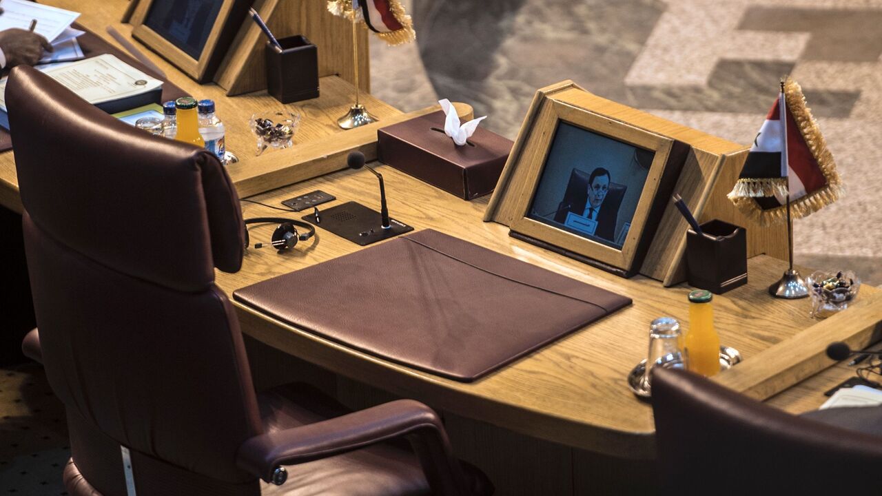 649051784 The empty seat of Syria is seen during a meeting of foreign ministers at the headquarters of the Arab League in the Egyptian capital Cairo, on March 7, 2017. / AFP PHOTO / KHALED DESOUKI (Photo credit should read KHALED DESOUKI/AFP via Getty Images)