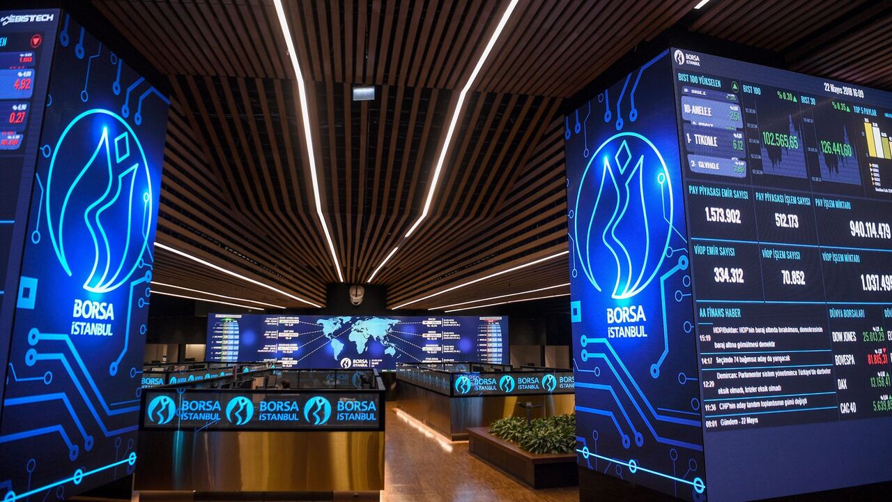 961456136 Grapfics and numbers of trade markets are screened on the floor of the Borsa Istanbul on May 22, 2018 in Istanbul. - Turkey's embattled currency, the Lira, on May 22 hit new historic lows against the US dollar after Fitch ratings agency expressed concerns over the central bank's independence in the wake of comments by President Recep Tayyip Erdogan. (Photo by OZAN KOSE / AFP) (Photo credit should read OZAN KOSE/AFP via Getty Images)