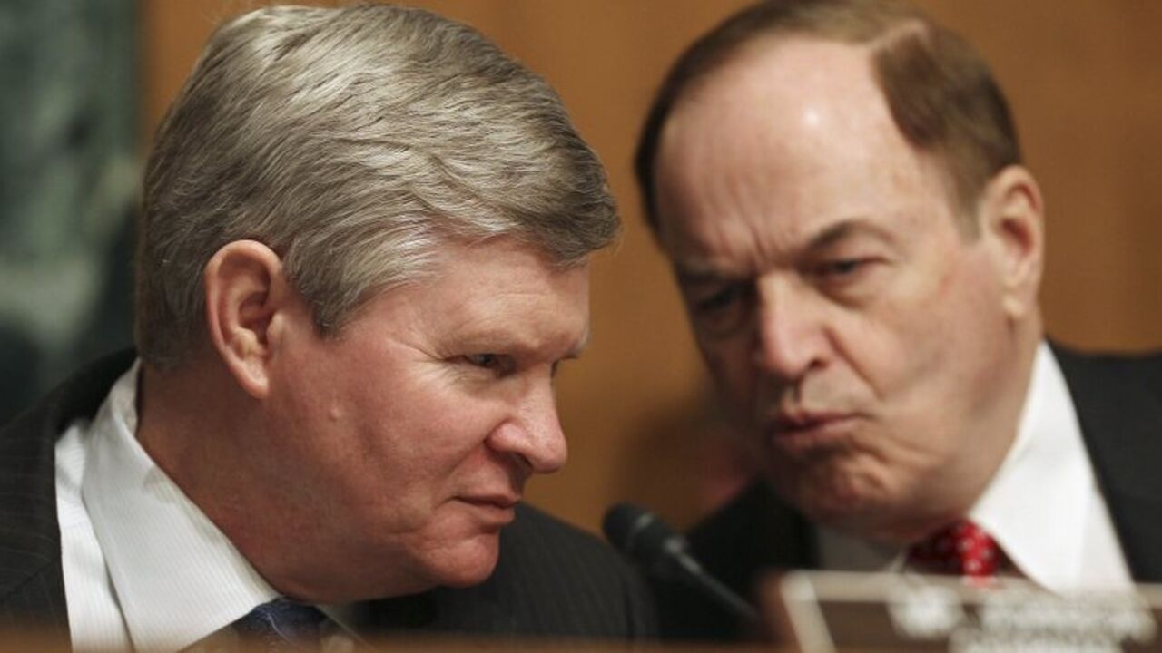 Senators Johnson and Shelby confer during the Senate Banking Housing and Urban Affairs Committee in Washington (From L) Senator Tim Johnson (D-SD), chairman of the Senate Banking, Housing and Urban Affairs Committee, confers with Senator Richard Shelby (R-AL) during their hearing on the collapse of MF Global in Washington April 24, 2012.
REUTERS/Gary Cameron (UNITED STATES - Tags: BUSINESS POLITICS) - RTR315VF