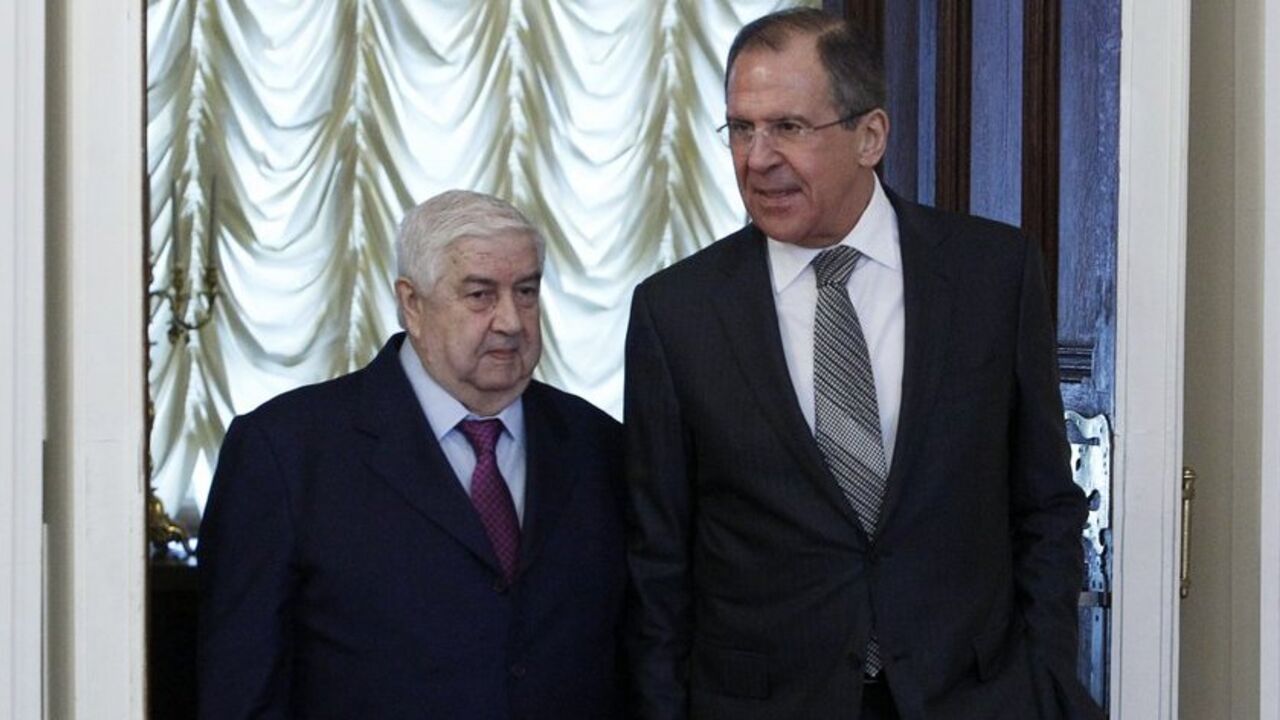 Russia's Foreign Minister Sergei Lavrov and his Syrian counterpart Walid al-Moualem walk into a hall during a meeting in Moscow Russia's Foreign Minister Sergei Lavrov (R) and his Syrian counterpart Walid al-Moualem walk into a hall during a meeting in Moscow, February 25, 2013. Syrian Foreign Minister Walid al-Moualem said on Monday Damascus was ready to talk to the country's armed opposition, Russian news agency Itar-Tass reported. REUTERS/Sergei Karpukhin (RUSSIA - Tags: POLITICS) - RTR3E9P8