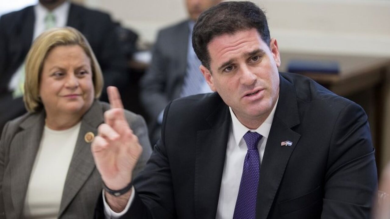 Israeli Ambassador to the United States Ron Dermer speaks to members of Congress about Israel's ongoing air campaign against Hamas for missile attacks Israeli Ambassador to the United States Ron Dermer (R) speaks to members of Congress about Israel's ongoing air campaign against Hamas for missile attacks during a meeting on Capitol Hill in Washington July 11, 2014. REUTERS/Joshua Roberts (UNITED STATES - Tags: POLITICS) - RTR3Y6P1