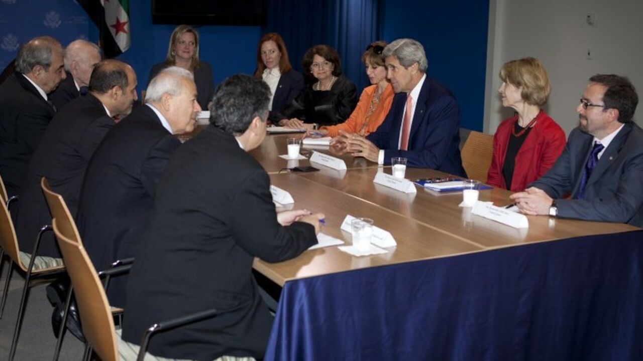 U.S. Secretary of State John Kerry meets with members of the Syrian Opposition Coalition at the United States Mission to the United Nations in New York U.S. Secretary of State John Kerry (3rd R) meets with members of the Syrian Opposition Coalition at the United States Mission to the United Nations in New York, July 25, 2013. REUTERS/Carlo Allegri (UNITED STATES - Tags: POLITICS) - RTX11Z6I