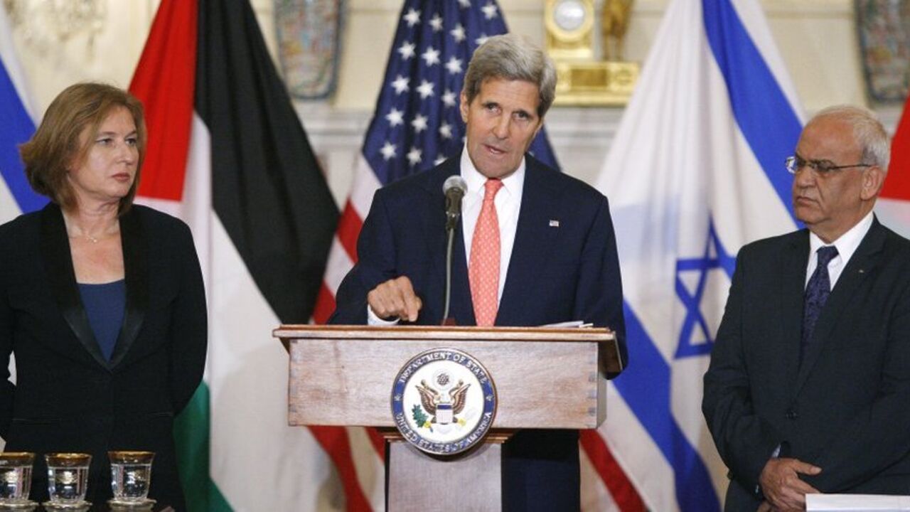 U.S. Secretary of State John Kerry announces further peace talks at a news conference with Israel's Justice Minister Tzipi Livni and Chief Palestinian negotiator Saeb Erekat in Washington U.S. Secretary of State John Kerry announces further peace talks at a news conference with Israel's Justice Minister Tzipi Livni (L) and Chief Palestinian negotiator Saeb Erekat (R) at the State Department in Washington July 30, 2013. Israel and the Palestinians will seek to reach a peace agreement within nine months and negotiators will meet again within two weeks after holding a "positive" first round of talks, Kerry said on Tuesday. REUTERS/Jonathan Ernst (UNITED STATES - Tags: POLITICS) - RTX1250P