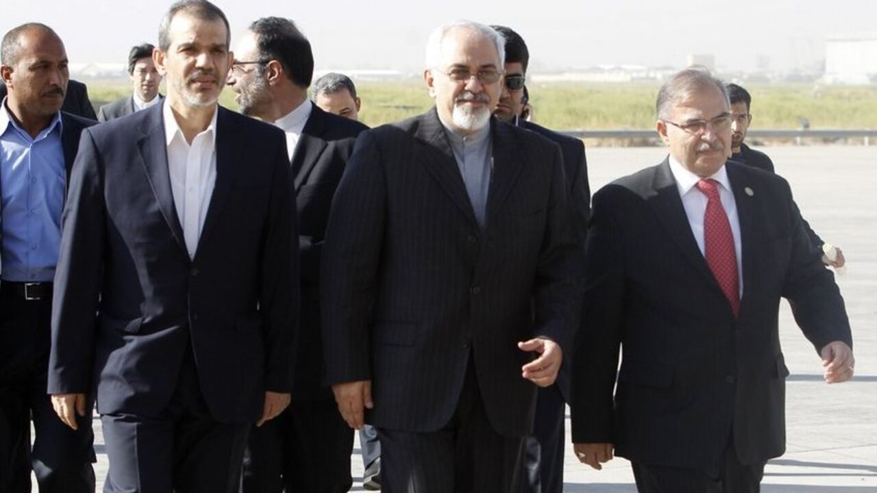 Iran's Foreign Minister Mohammad Javad Zarif arrives at Baghdad International Airport Iran's Foreign Minister Mohammad Javad Zarif (C) arrives at Baghdad International Airport September 8, 2013. Zarif visited Iraq on Sunday to discuss what he called the "dangerous situation" in Syria and the wider region. REUTERS/ Saad Shalash (IRAQ - Tags: POLITICS) - RTX13CKO