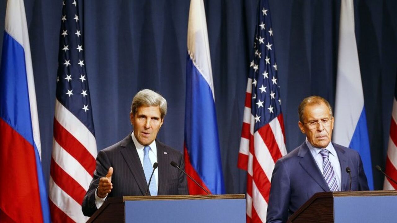 Russia's Foreign Minister Lavrov and U.S. Secretary of State Kerry hold a news conference at a hotel in Geneva Russia's Foreign Minister Sergey Lavrov (R) and U.S. Secretary of State John Kerry hold a news conference at a hotel in Geneva September 12, 2013. Kerry flew into Geneva on Thursday to hear Russia's plans to disarm Syria of its chemical weapons and avert U.S.-led military strikes, an initiative that has transformed diplomacy in the two-and-a-half year old civil war. REUTERS/Ruben Sprich (SWITZERLAND - Tags: POLITICS) - RTX13J2W