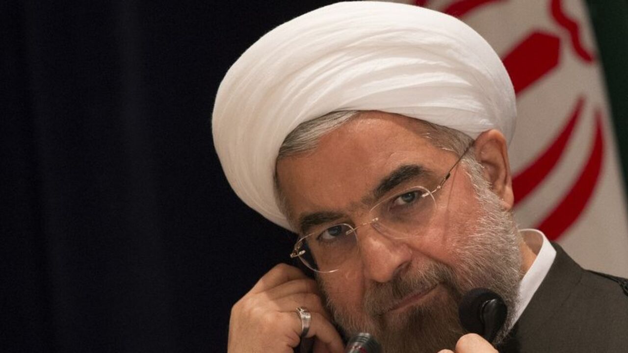 Iran's President Hassan Rouhani takes questions from journalists during a news conference in New York Iran's President Hassan Rouhani takes questions from journalists during a news conference in New York September 27, 2013. New Iranian President Rouhani said on Friday he wanted talks with major powers on Iran's nuclear program to yield results in a short period of time and that the improved mood in U.S.-Iranian relations could lead to better ties. REUTERS/Adrees Latif (UNITED STATES - Tags: POLITICS ENERGY) - RTX142CR