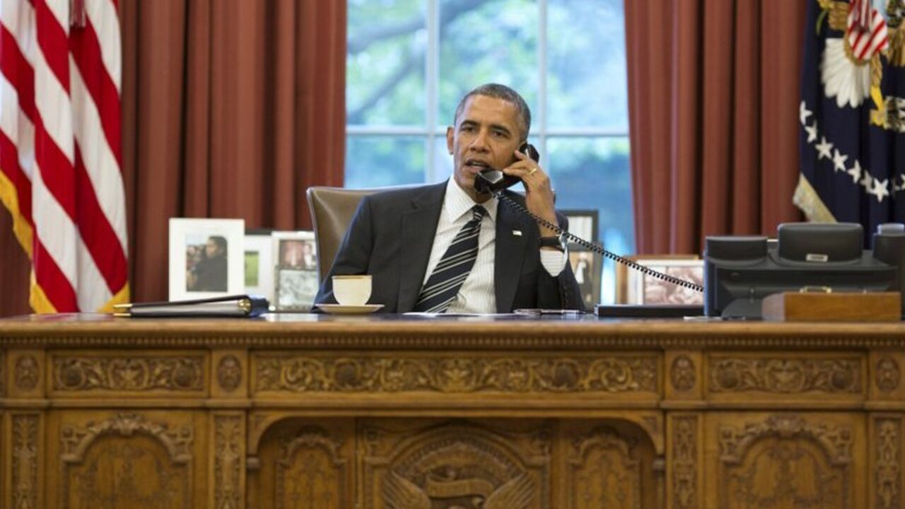 U.S. President Obama talks on the phone with Iranian President Rouhani in the Oval Office at the White House in Washington U.S. President Barack Obama talks with Iranian President Hassan Rouhani during a phone call in the Oval Office at the White House in Washington September 27, 2013. U.S. President Barack Obama and new Iranian President Hassan Rouhani held the historic phone call on Friday, in the highest level conversation between the estranged nations in more than three decades. Speaking to reporters at the White House, Obama said both men had directed their teams to work expeditiously toward an agreement on Iran's nuclear