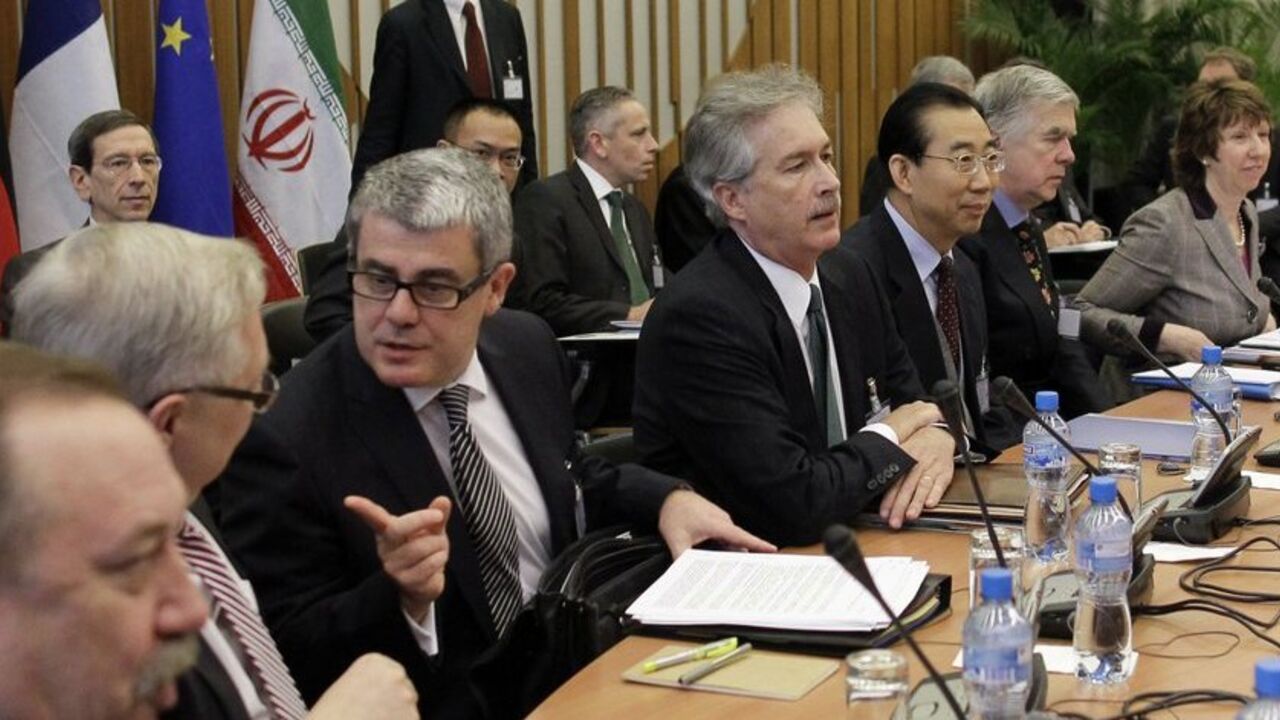 Delegates arrive for meeting with Iranian representatives at conference centre near the Swiss mission to the United Nations in Geneva Jacques Audibert, General and Stategic Affairs director of France (3rd L) talks to Russia's Deputy Foreign Minister Sergey Ryabkov (2nd L) as U.S. ambassador William Burns (C) Chinese assistant Foreign Minister Hailong Wu, European political adviser Robert Cooper from Britain and EU foreign policy chief Catherine Ashton (4th L-R) arrive for a meeting at the conference centre near the Swiss mission to the United Nations in Geneva, December 6, 2010. Six world powers began their first talks with Iran in more