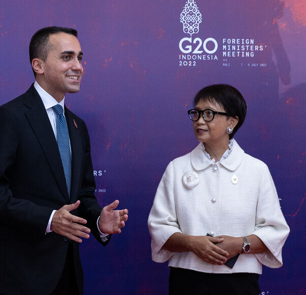 NUSA DUA, INDONESIA - JULY 08: The Indonesian Minister for Foreign Affairs, Retno Marsudi (R) greets the Italian Minister of Foreign Affairs, Luigi Di Maio (L) during arrival of the G20 Foreign Ministers and Head of Department at the Grand Ballroom Mulia Hotel on July 08, 2022 in Nusa Dua, Indonesia. (Photo by Robertus Pudyanto/Getty Images)