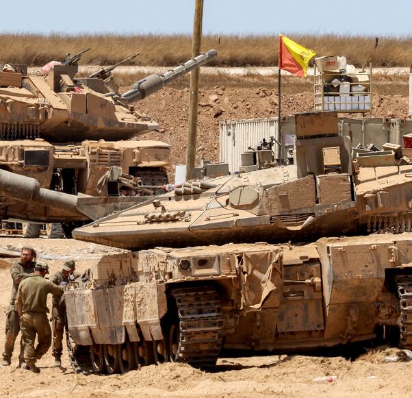 Israeli tanks are positioned along the border with the Gaza Strip, on June 5, 2025, amid the ongoing war between Israel and Hamas.