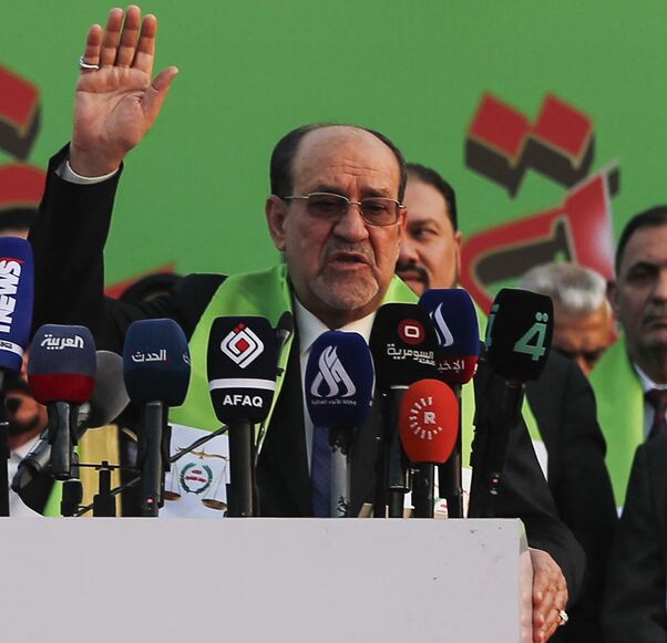 Former Iraqi Prime Minister Nouri al-Maliki delivers a speech during a campaign rally for the State of Law Coalition ahead of the country's parliamentary elections in Baghdad on Nov. 7, 2025. 
