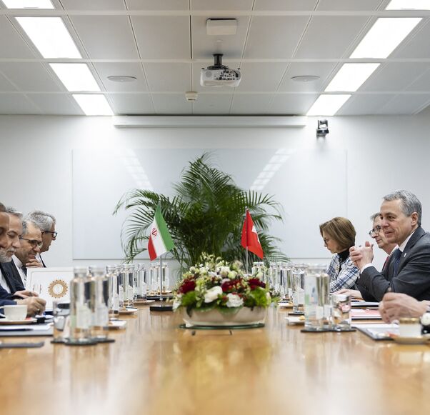 Iran's Foreign Minister Abbas Araghchi (3rd L) and Switzerland's Foreign Minister Ignazio Cassis (2nd R) attend a bilateral meeting between Switzerland and Iran during a second round of US-Iranian talks with Washington pushing Tehran to make a deal to limit its nuclear program, in Geneva on Feb. 17, 2026. 