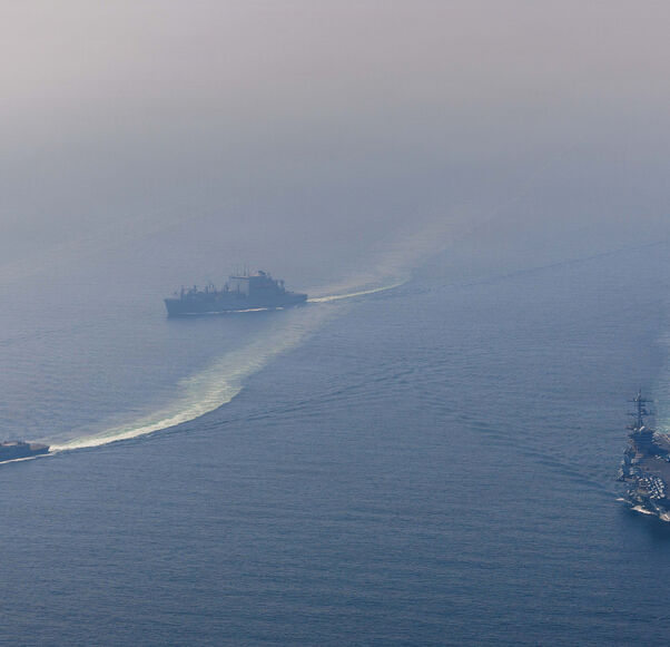 (EDITOR'S NOTE: This Handout image was provided by a third-party organization and may not adhere to Getty Images' editorial policy.) In this handout photo obtained from the U.S. Defence Department, Nimitz-class aircraft carrier USS Abraham Lincoln (CVN 72) sails alongside Arleigh Burke-class guided-missile destroyer USS Frank E. Petersen Jr. (DDG 121) and Lewis and Clark-class dry cargo ship USNS Carl Brashear (T-AKE 7) in the Arabian Sea, Feb. 6, 2026. According to the U.S. government, the Abraham Lincoln 