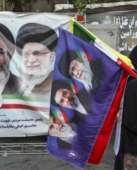 People from Tehran province gather in support and allegiance to Iranian Supreme Leader Mojtaba Khamenei, while holding Iranian flags and images of both the new and former leaders of Iran, on June 12, 2026, at Palestine Square in Tehran, Iran. 