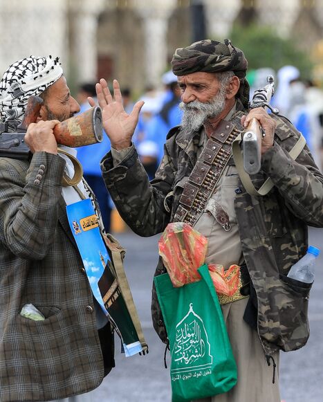 Supporters of the Houthi authorities hold their weapons during a protest against the Saudi intervention in Yemen and against Saudi Arabia's recent accusation that the Houthis fired at the holy city of Mecca, in Sanaa, on Sept. 18, 2026. 