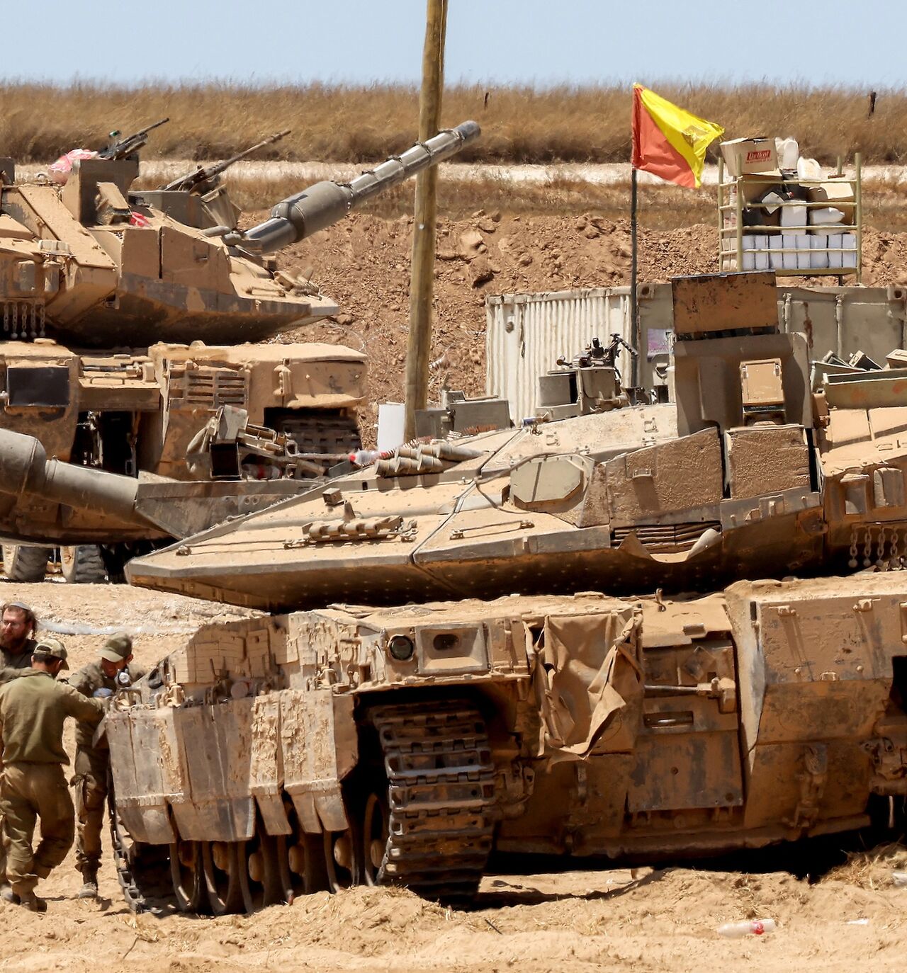 Israeli tanks are positioned along the border with the Gaza Strip, on June 5, 2025, amid the ongoing war between Israel and Hamas.