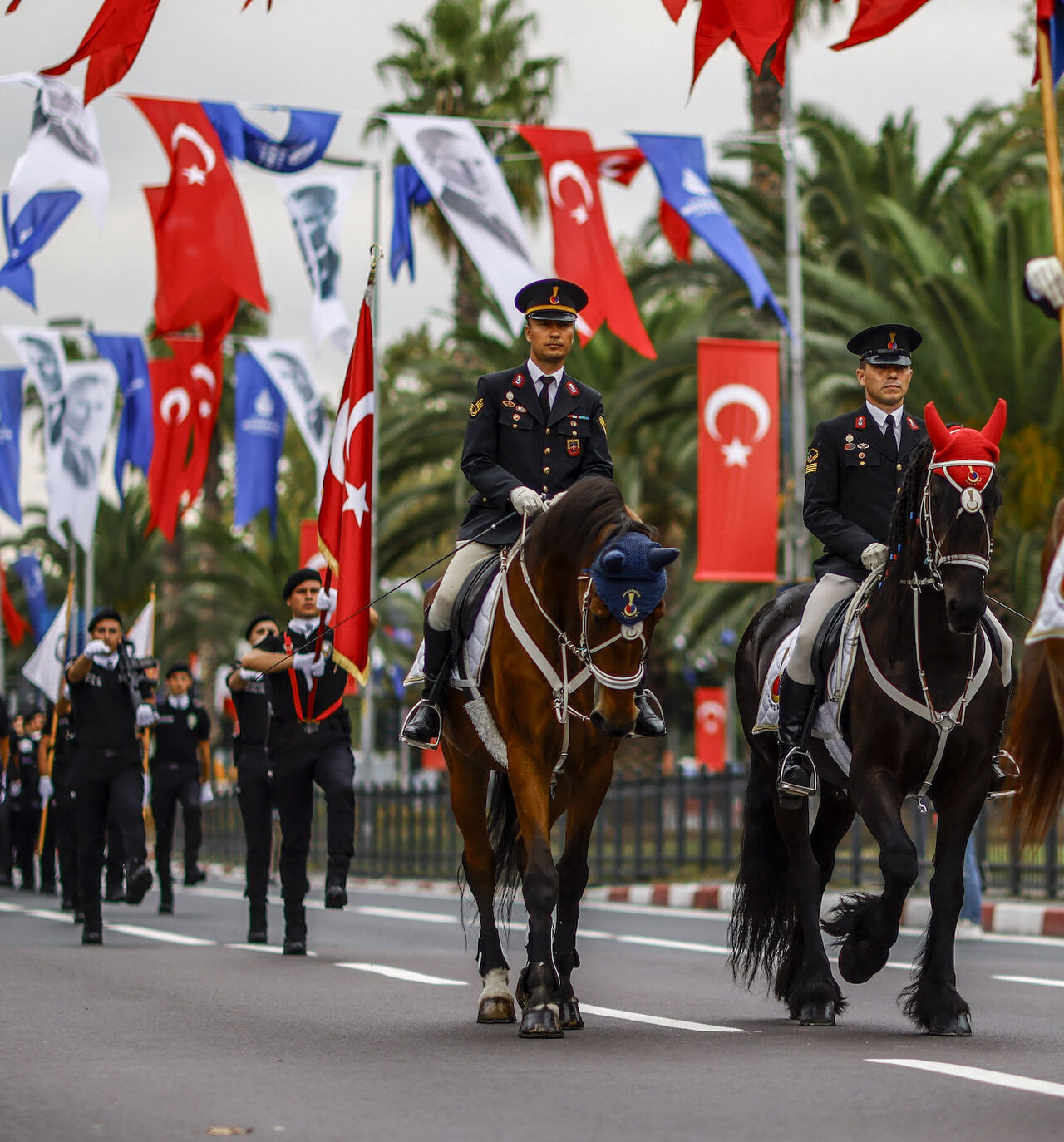 Turkish soldiers march, including some on horses, during a military parade marking the 102nd anniversary of the Victory Day at Vatan Street in Istanbul on Aug. 30, 2024. 