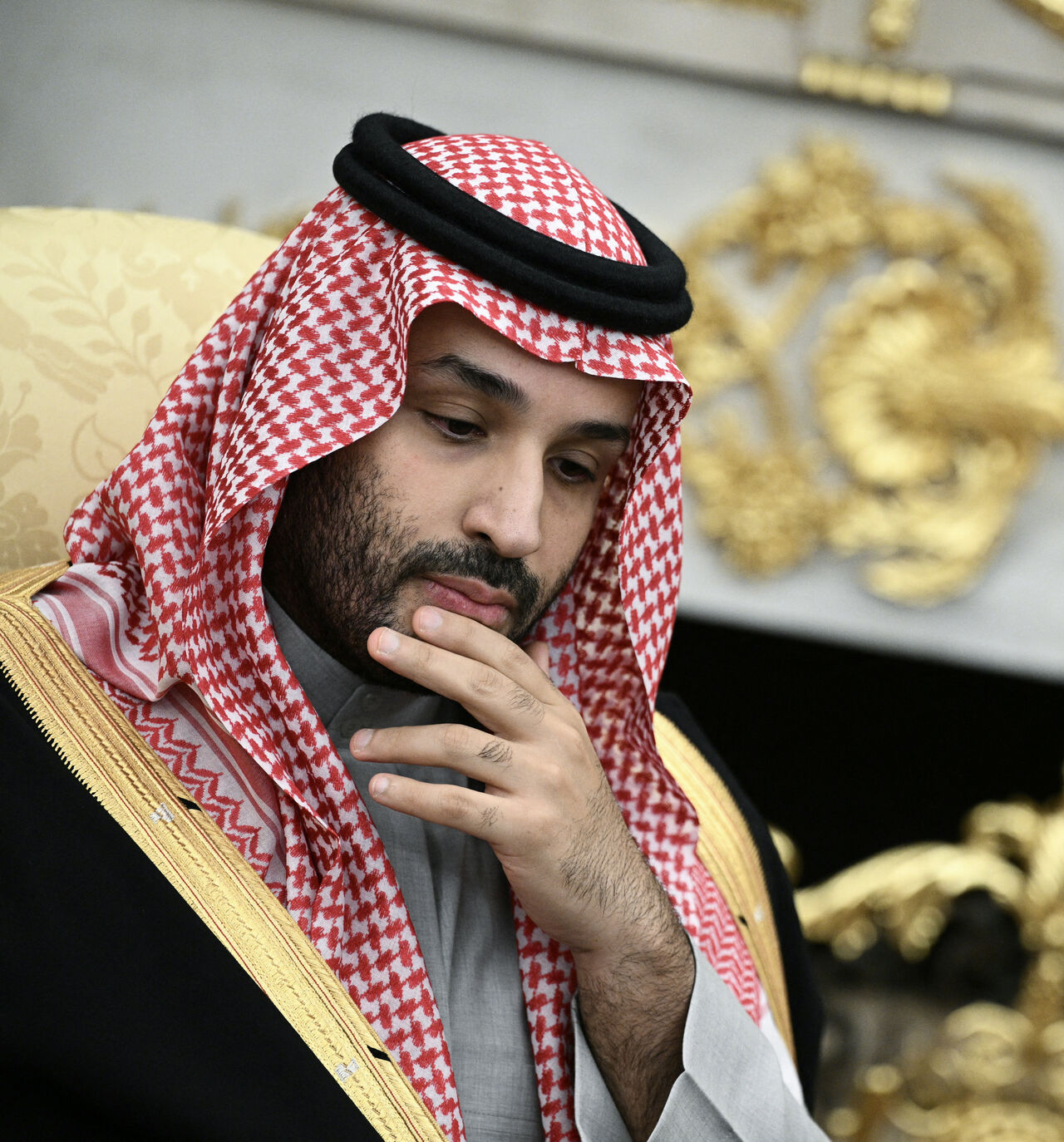 Crown Prince and Prime Minister of the Kingdom of Saudi Arabia Mohammed bin Salman looks on during a meeting with US President Donald Trump (not pictured) in the Oval Office of the White House in Washington, DC on November 18, 2025. Saudi Crown Prince Mohammed bin Salman arrived at the White House to fanfare and a jet flyover Tuesday, in his first visit to the United States since the 2018 murder of journalist Jamal Khashoggi. (Photo by Brendan SMIALOWSKI / AFP) (Photo by BRENDAN SMIALOWSKI/AFP via Getty Ima