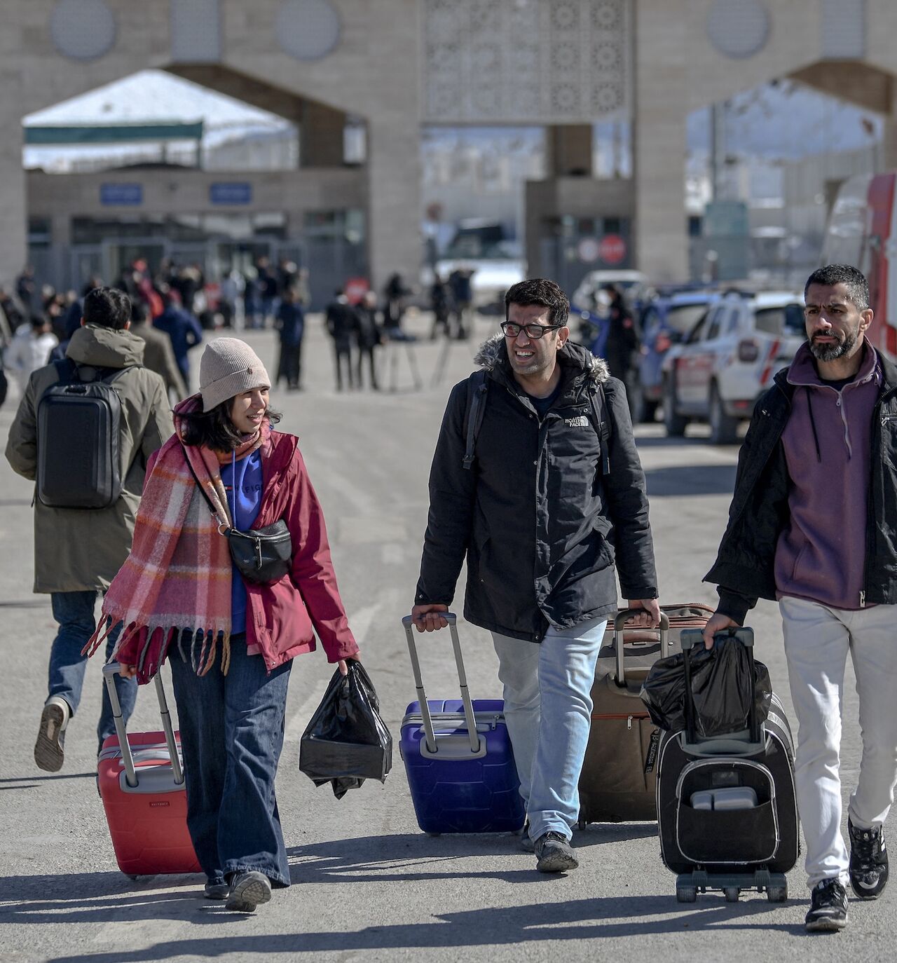 Iranian nationals arrive in Turkey after passing through the Razi-Kapikoy border crossing in Van, northeastern Turkey, on March 3, 2026.