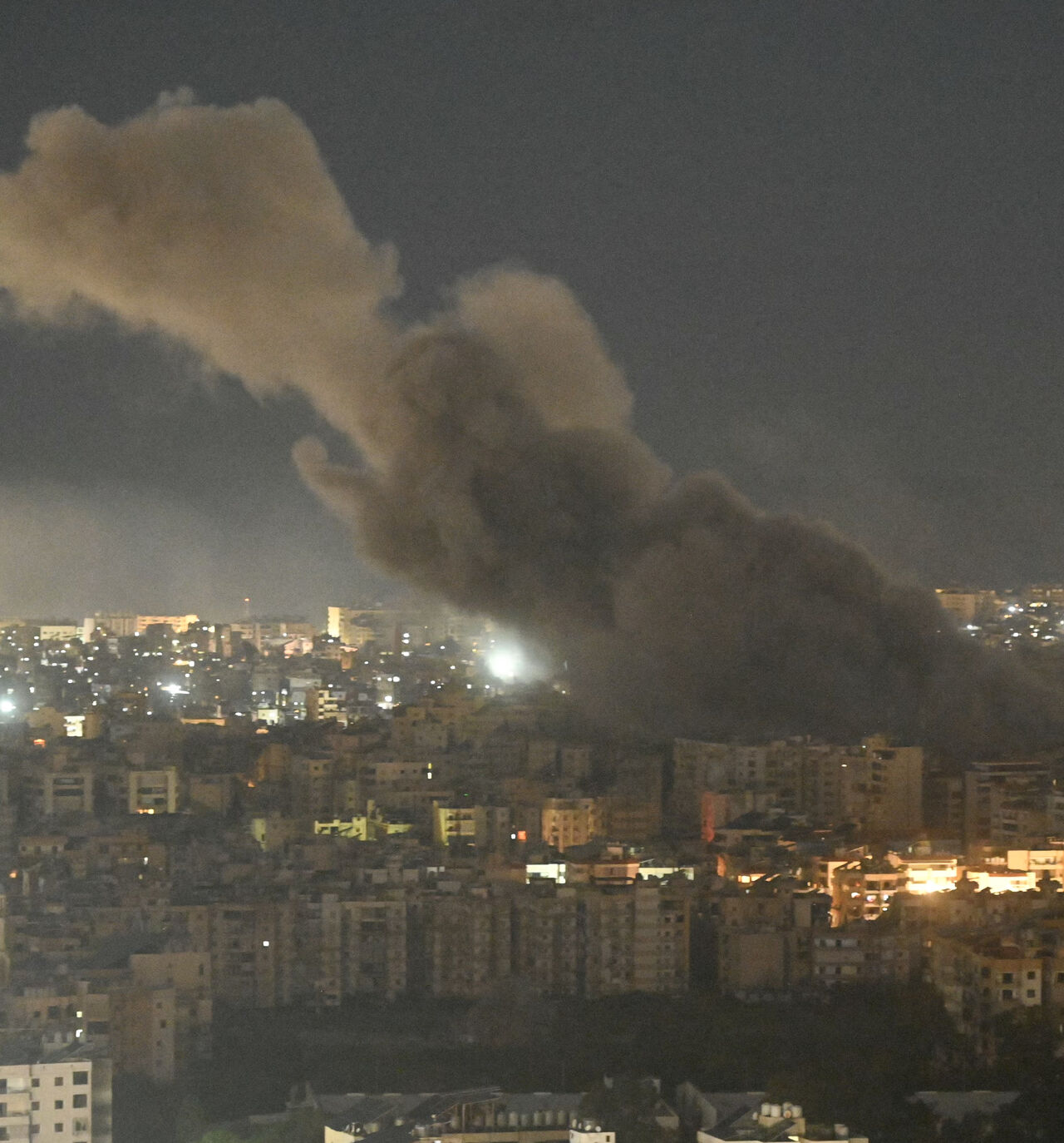 Smoke rises after an Israeli airstrike targeted an area in Beirut's southern suburbs on March 7, 2026. (Photo by FADEL itani / AFP via Getty Images)