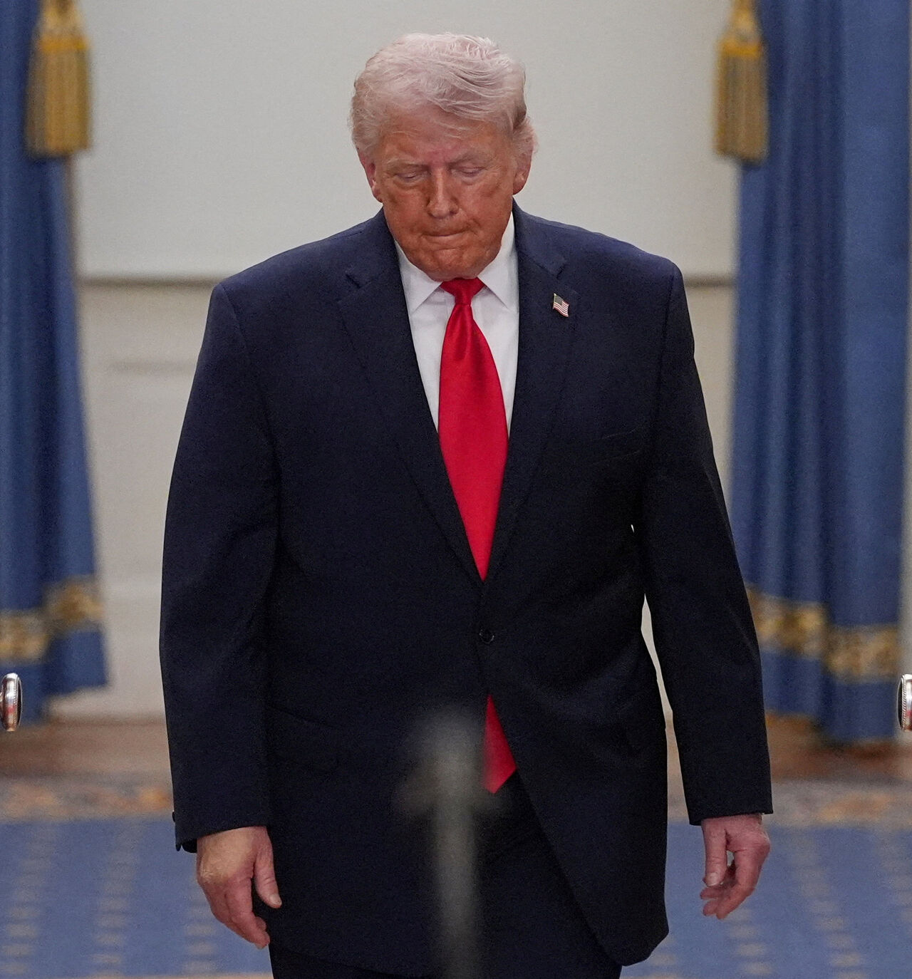 FILE PHOTO: President Donald Trump arrives to speak about the Iran war from the Cross Hall of the White House on Wednesday, April 1, 2026, in Washington.     Alex Brandon/Pool via REUTERS/File Photo