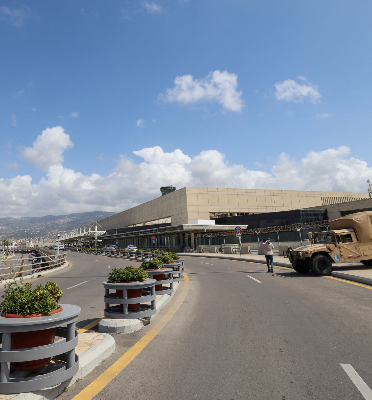 A Lebanese army vehicle is parked at the departures area of Beirut's Rafik Hariri airport on April 10, 2026. Israel's military on April 9 warned residents of Beirut's southern suburbs, long a stronghold of Lebanese militant group Hezbollah, of imminent strikes and called for them to evacuate. While Israel regularly issues evacuation warnings before bombing the southern suburbs, the announcement also included the outskirts of Lebanon's only international airport. (Photo by Anwar AMRO / AFP via Getty Images)
