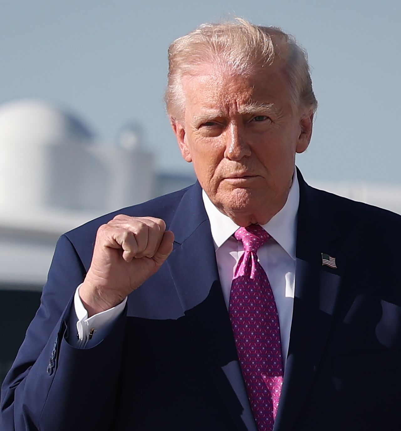 President Donald Trump walks toward reporters before answering questions before boarding Air Force One on April 10, 2026, at Joint Base Andrews, Maryland.